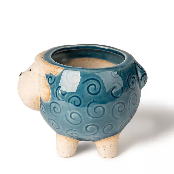 Ang may hawak na ceramic na may hawak na kandila